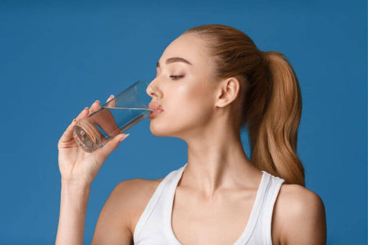 a woman drinking water